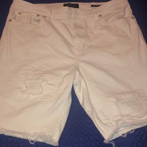Stylish white ripped jean shorts